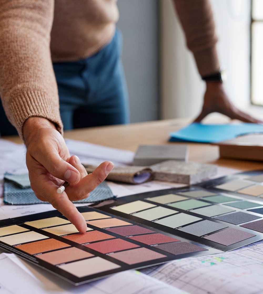 close-up-of-architect-s-hand-pointing-color-palett-2026-01-07-00-20-34-utc